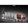 Các cụm rời của 12GO 95026: sàn đường đua, pit wall đỏ, xe F1, máy quay và thùng thiết bị