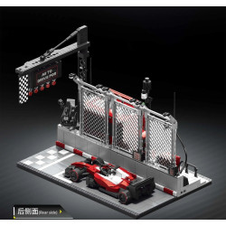 Mặt sau bên của trạm xuất phát 12GO 95026 với bảng ALL TO DRIVE FOR, năm đèn đỏ và xe F1