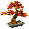 Bonsai phong đỏ Beauty And 13125 hoàn chỉnh: tán lá đỏ cam điểm vàng, thân nâu uốn cong, chậu xám kèm đèn đá nhỏ
