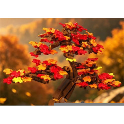 Cận cảnh tán lá bonsai phong đỏ 13125: chùm lá đỏ, cam, vàng xếp tầng trên cành nâu, nền lá thu vàng mờ phía sau