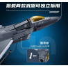 Cận cảnh mũi và nắp buồng lái vàng của Sluban M38-B1613, kèm ô nhỏ minh họa tên lửa AIM-9X nằm trong khoang bên hông