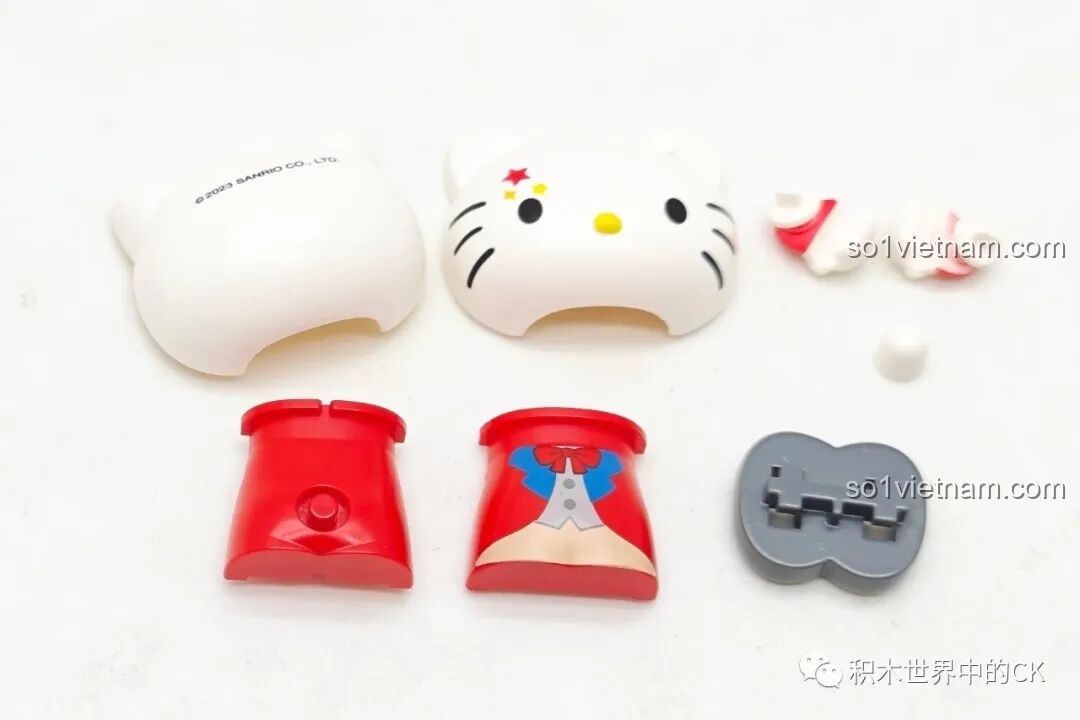 Các bộ phận để lắp ráp thành minifigure Hello Kitty trong bộ Keeppley K20823, với trang phục ảo thuật gia.