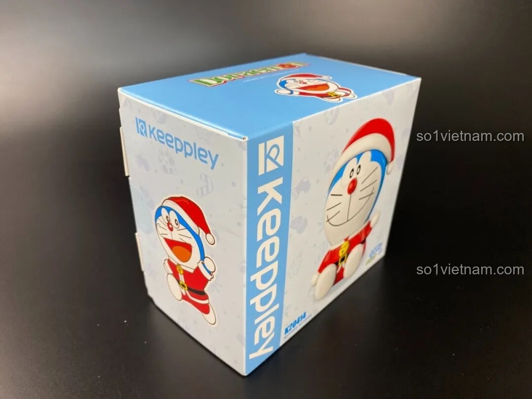 Mặt sau hộp Keeppley Doraemon K20414 với thông tin kích thước và hình ảnh minh họa sản phẩm.